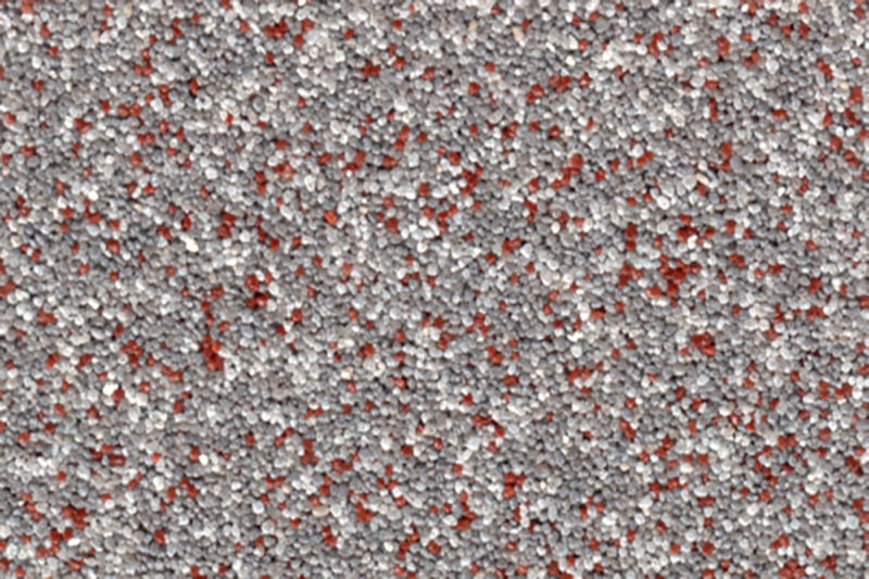 Coloritquarz als Bodenbelag oder dekorative Einstreuung in der Farbe grau-weiß-rot