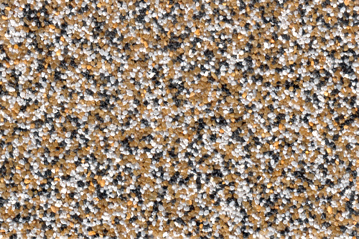 Coloritquarz als Bodenbelag oder Einstreuung in der Farbe gelb-weiß-schwarz